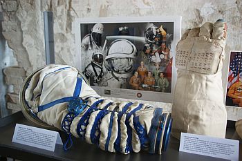 Sleeves of an Orlan space suit plus glove by Anatoly Solowjow (both flown!)